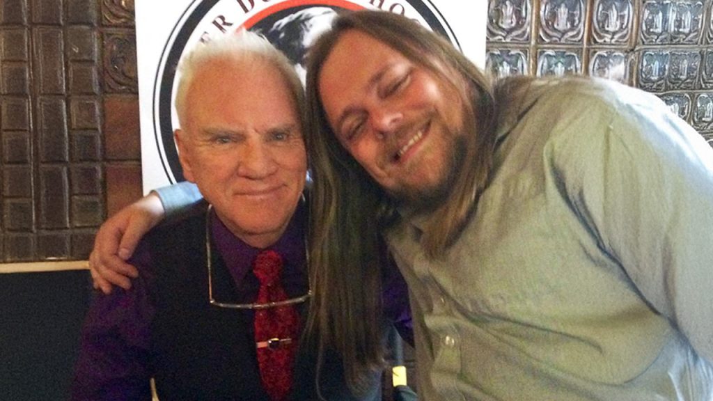 Lawrie Brewster, Malcolm McDowell