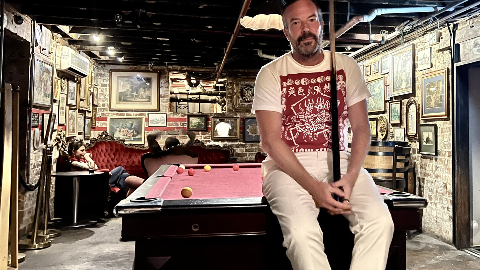 Simon Rumley in a pool hall.