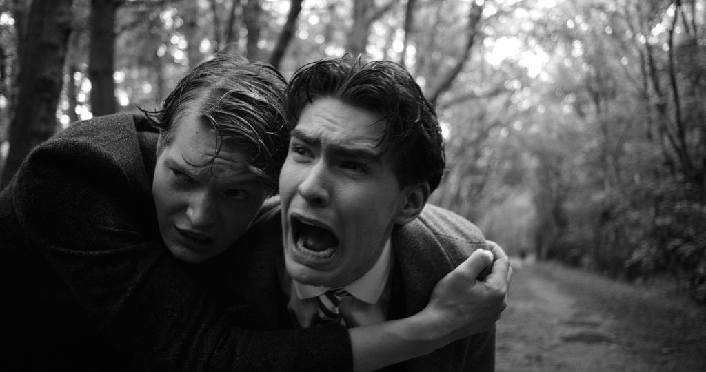 Dorian Todd and Sam McMillan together in the woods in Black Chariot